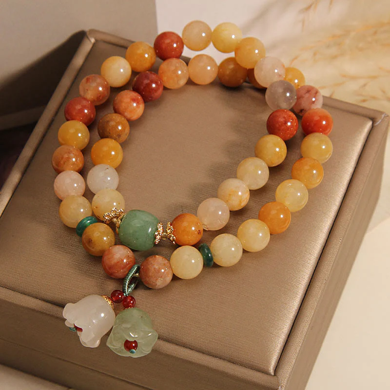 Braccialetto portafortuna a doppio strato con campanella e orchidea in seta dorata naturale del Tibet, Buddha Stones - Image 5
