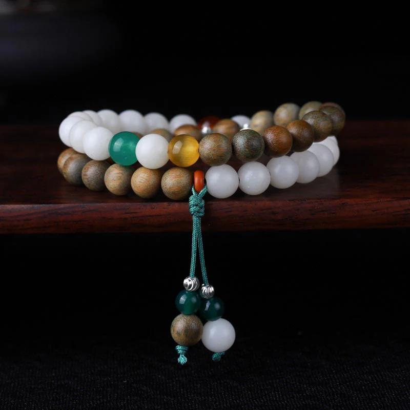 Braccialetto portafortuna con semi di Bodhi in sandalo verde