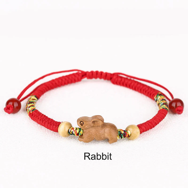 Braccialetto portafortuna in legno di pesca con corda rossa, fatto a mano, con zodiaco cinese di Buddha Stones - Image 2