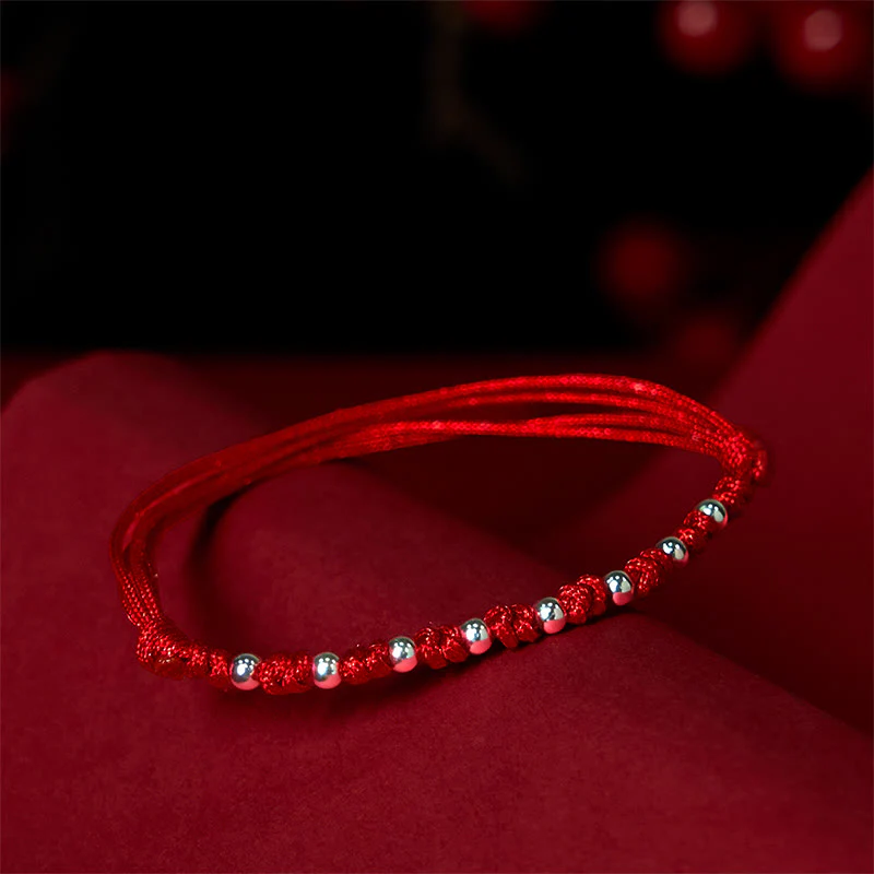 Braccialetto portafortuna regolabile con perline in argento sterling 925 e cordino rosso Buddha Stones - Image 3