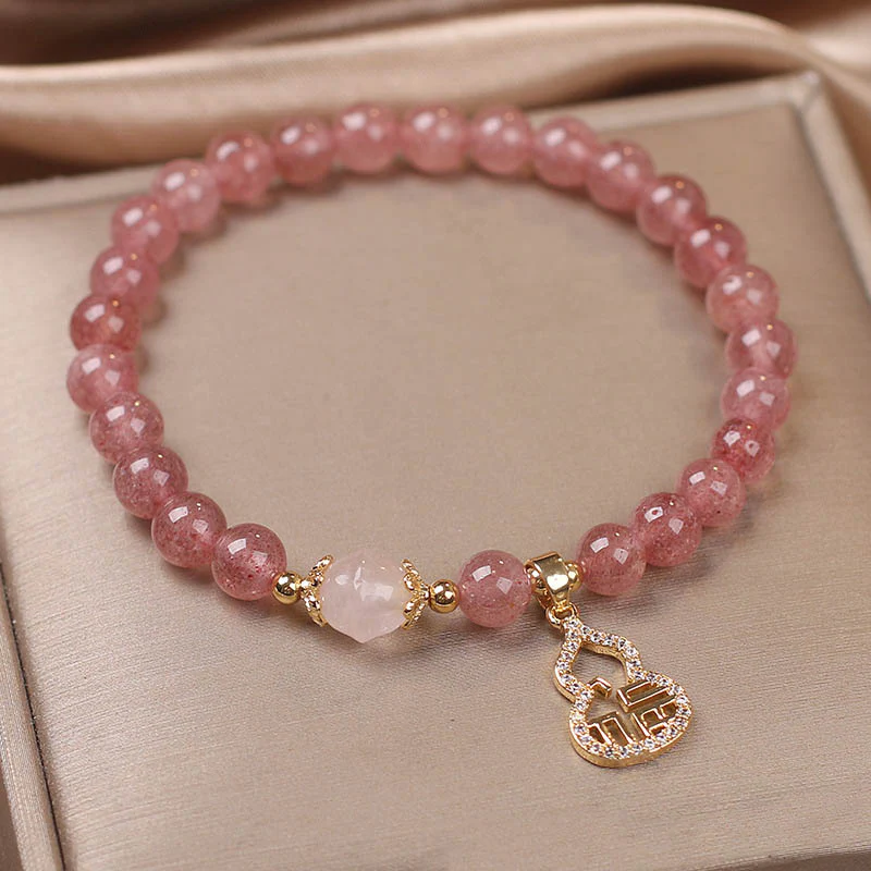 Braccialetto positivo con ciondolo a forma di carattere Fu di zucca e quarzo fragola Buddha Stones - Image 3