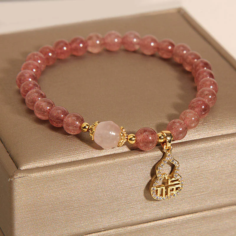 Braccialetto positivo con ciondolo a forma di carattere Fu di zucca e quarzo fragola Buddha Stones - Image 9