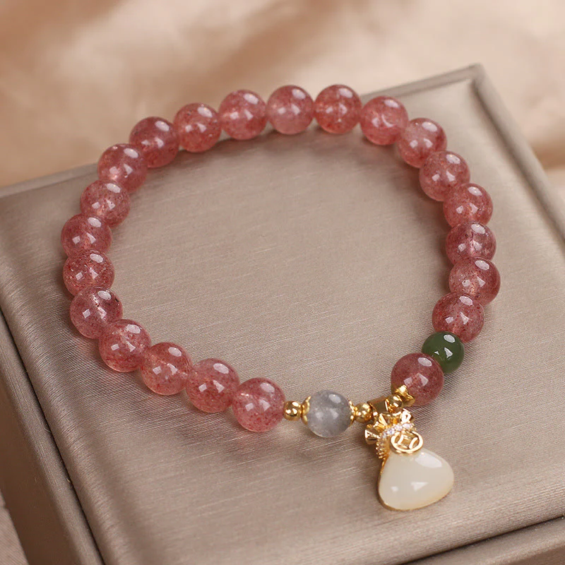 Braccialetto positivo con ciondolo a forma di sacco di soldi in quarzo fragola naturale Buddha Stones - Image 2