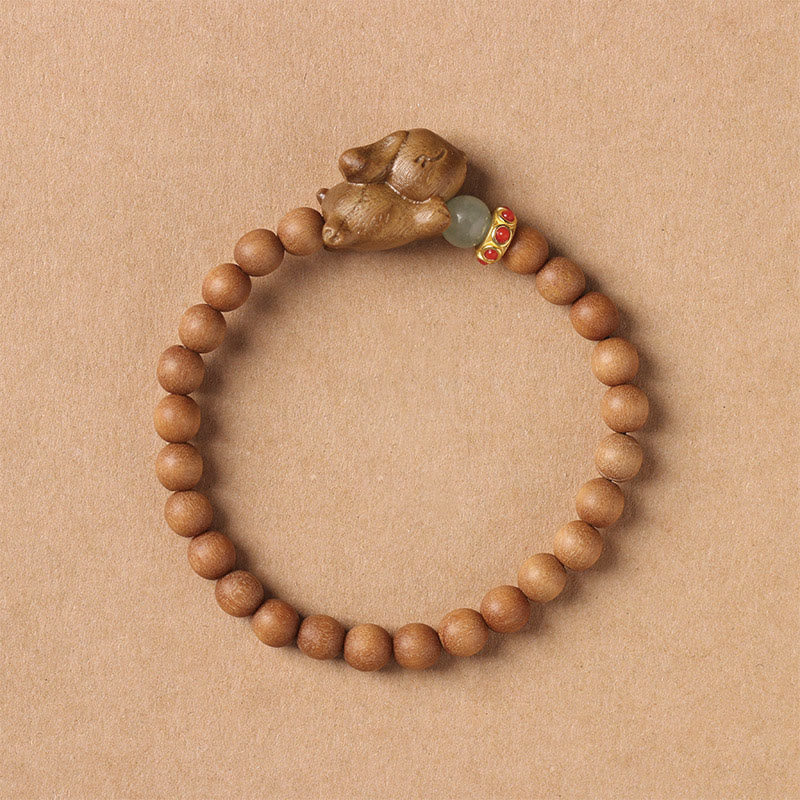 Braccialetto positivo con coniglio carino in legno di sandalo verde e oro Buddha Stones - Image 14