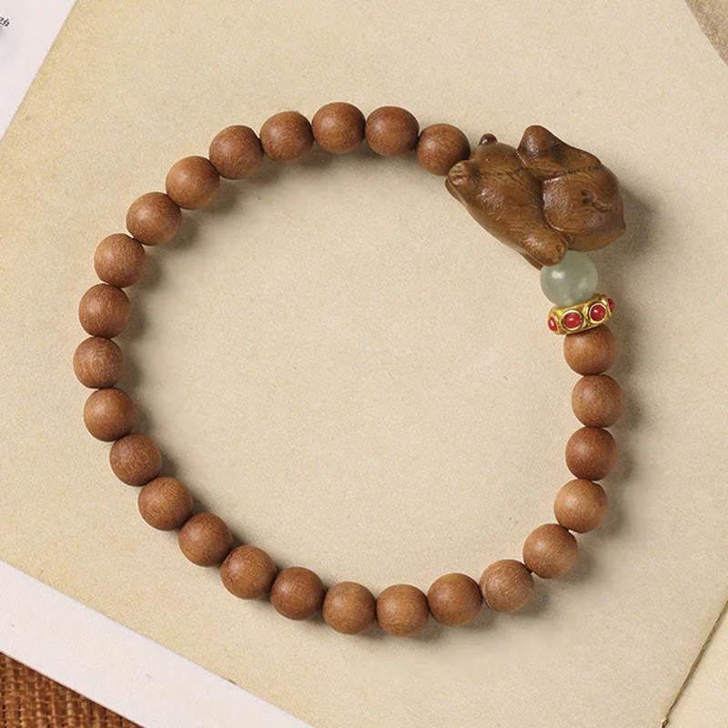 Braccialetto positivo con coniglio carino in legno di sandalo verde e oro Buddha Stones - Image 15