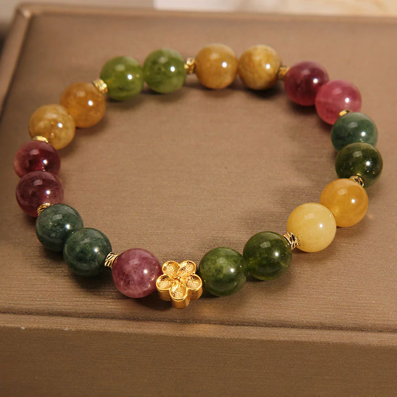 Braccialetto positivo con fiore dorato in tormalina colorata naturale Buddha Stones