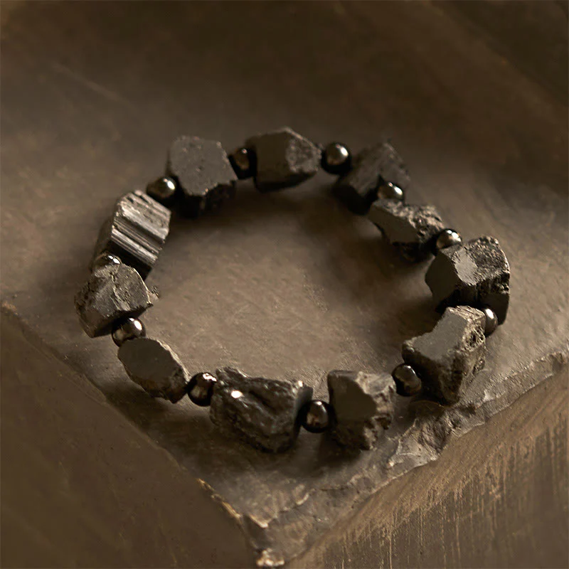 Braccialetto positivo con pietra irregolare in tormalina nera Buddha Stones