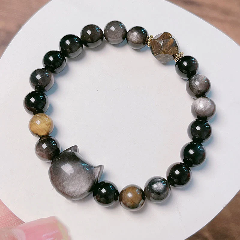 Braccialetto rilassante con perline di ossidiana lucida in argento naturale Buddha Stones - Image 10