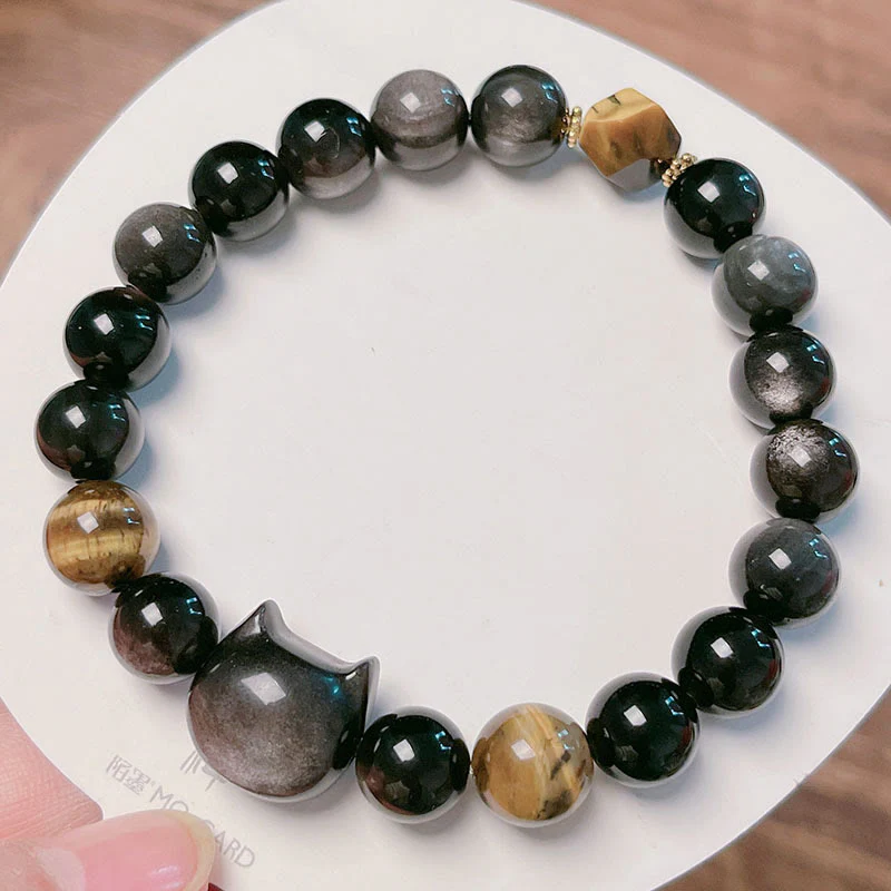 Braccialetto rilassante con perline di ossidiana lucida in argento naturale Buddha Stones - Image 11