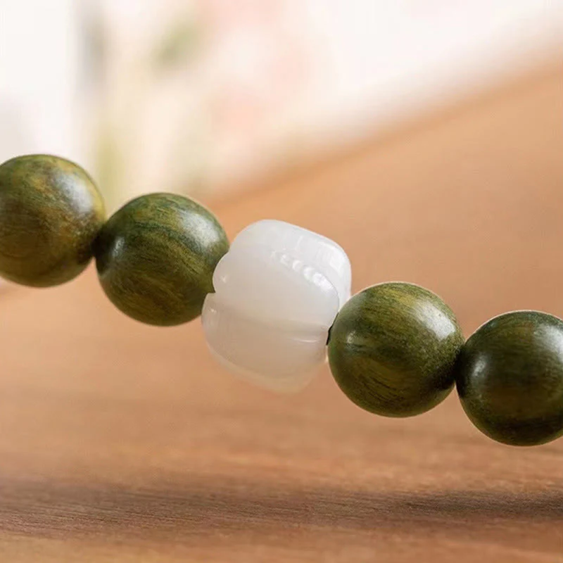 Braccialetto rilassante con semi di Bodhi in legno di sandalo verde naturale Buddha Stones - Image 10
