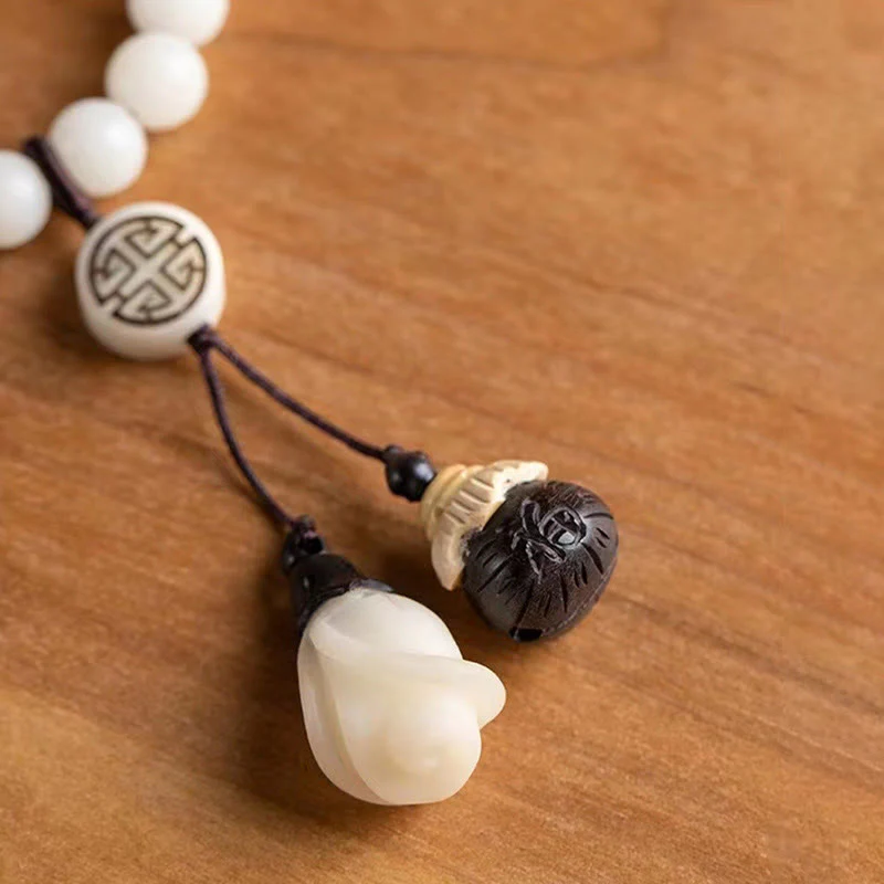 Braccialetto rilassante con semi di Bodhi in legno di sandalo verde naturale Buddha Stones - Image 11