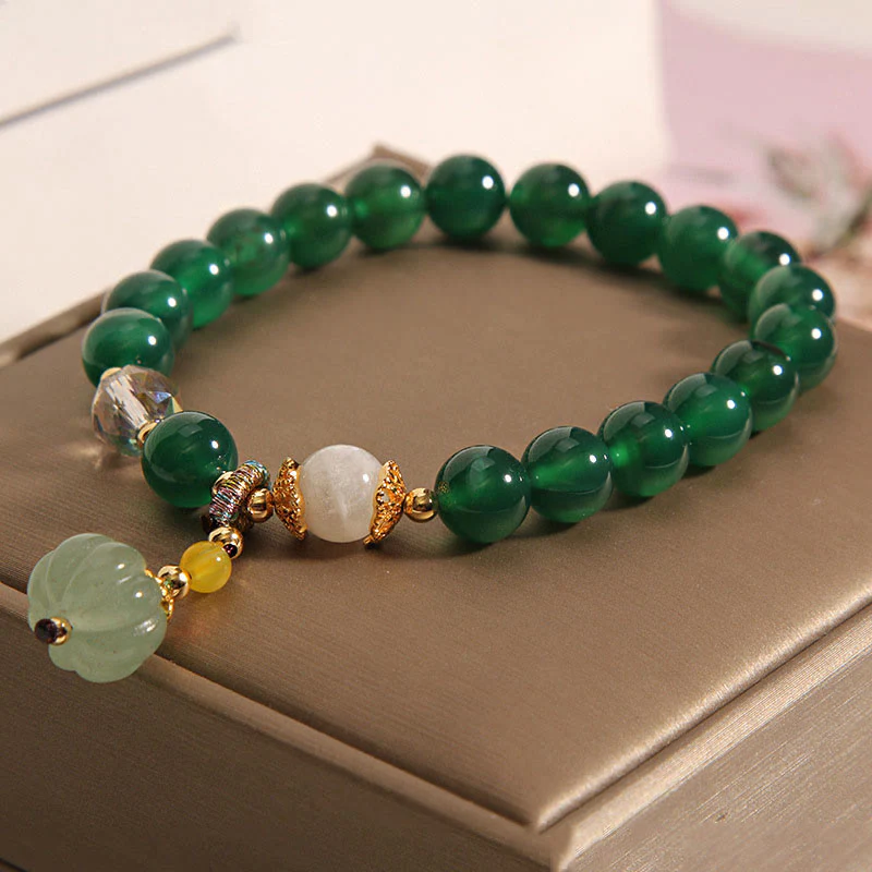 Braccialetto rilassante e calmo con perline di zucca in cristallo verde Buddha Stones - Image 2