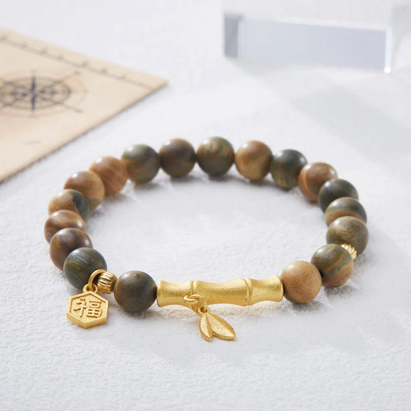 Braccialetto rilassante in bambù con carattere Fu in legno di sandalo verde Buddha Stones - Image 3