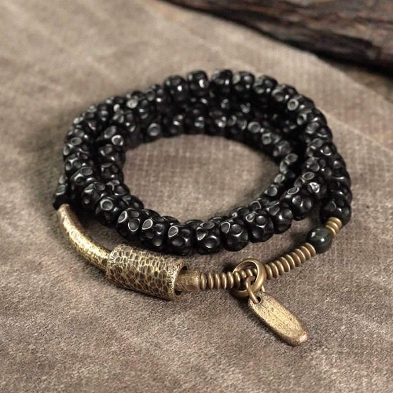 Bracciale triplo giro in ottone e rame con guscio di cocco retrò Buddha Stones