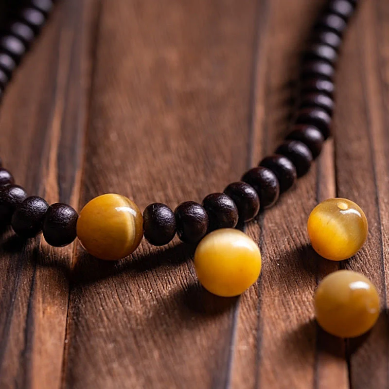Buddha Stones 108 Mala Beads Bowl Bodhi Seed Braccialetto della Pace in Corda Colorata - Image 8