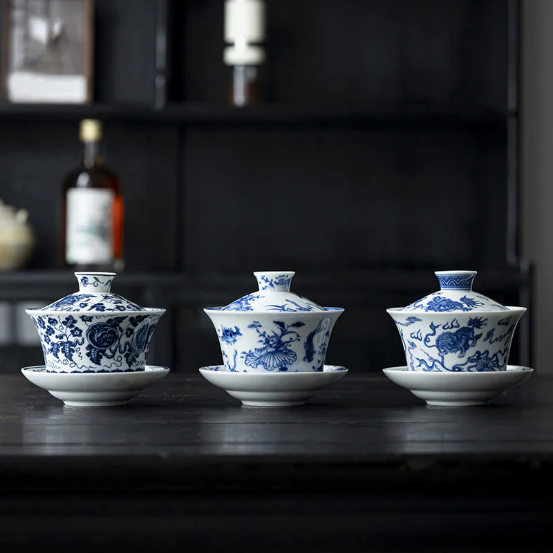 Buddha Stones Blu e Bianco Porcellana Loto Koi Pesce Danza del Leone Anguria Ceramica Gaiwan Sancai Tazza da Tè Kung Fu Tazza da Tè e Piattino con Coperchio 300ml - Image 2