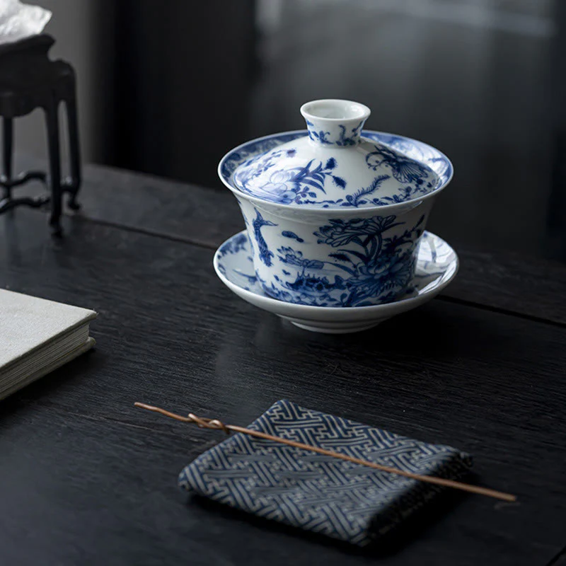 Buddha Stones Blu e Bianco Porcellana Loto Koi Pesce Danza del Leone Anguria Ceramica Gaiwan Sancai Tazza da Tè Kung Fu Tazza da Tè e Piattino con Coperchio 300ml - Image 9