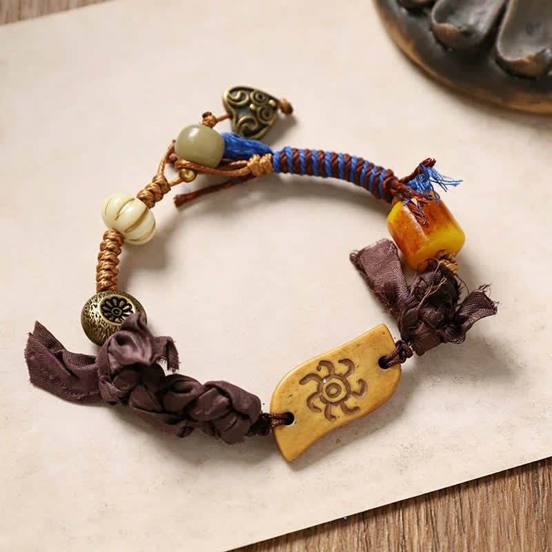 Buddha Stones Braccialetto della pace con corda intrecciata, personaggio Bone Fu. - Image 5