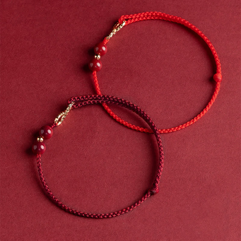 Braccialetto alla cavigliera con simbolo dell'infinito dorato e cordino rosso con Buddha Stones e cinabro. - Image 11