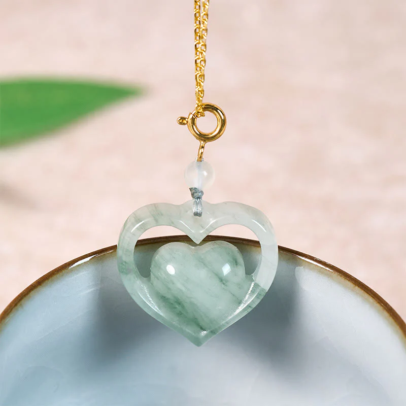 Buddha Stones Collana con ciondolo a forma di cuore vuoto in giada con abbondanza