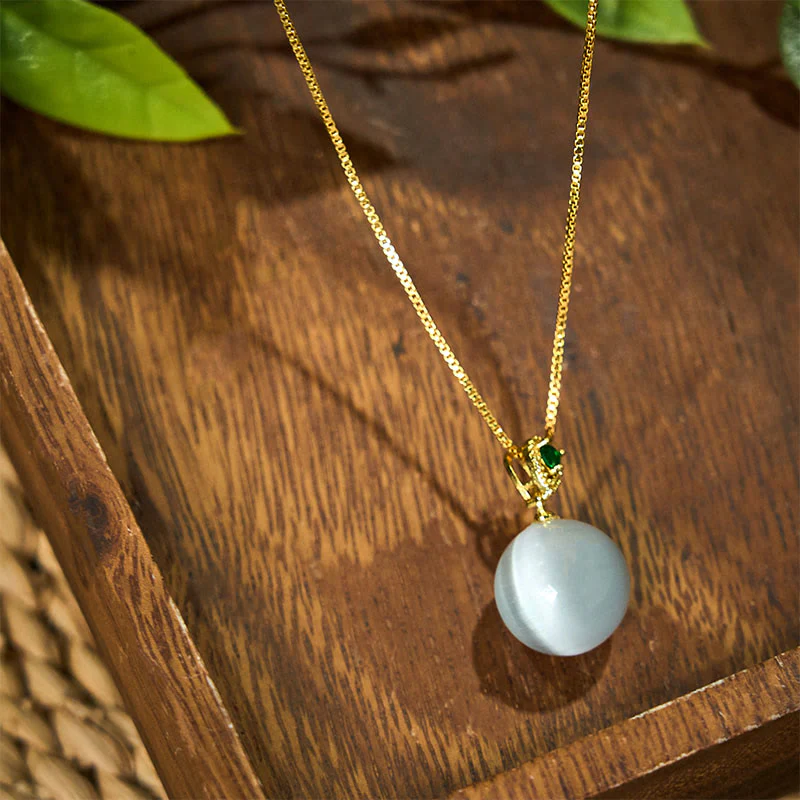 Buddha Stones Collana con ciondolo a forma di palla rotonda con occhio di gatto e simbolo di fiducia - Image 22