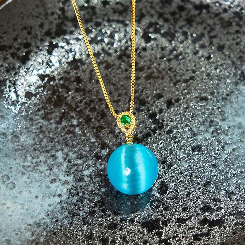 Buddha Stones Collana con ciondolo a forma di palla rotonda con occhio di gatto e simbolo di fiducia - Image 4