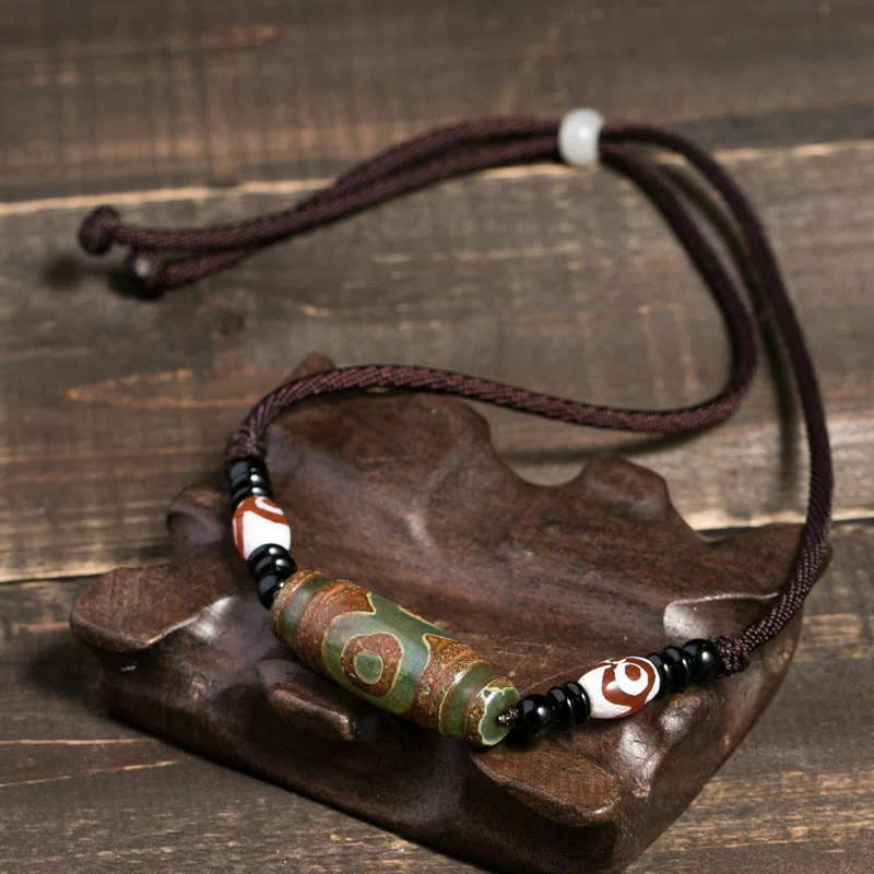 Buddha Stones Collana di perline tibetane Dzi a nove occhi con cordino protettivo - Image 6