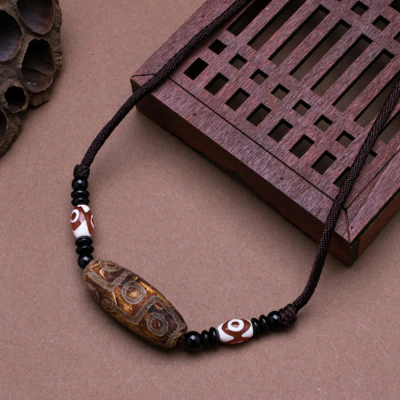 Buddha Stones Collana di perline tibetane Dzi a nove occhi con cordino protettivo - Image 8
