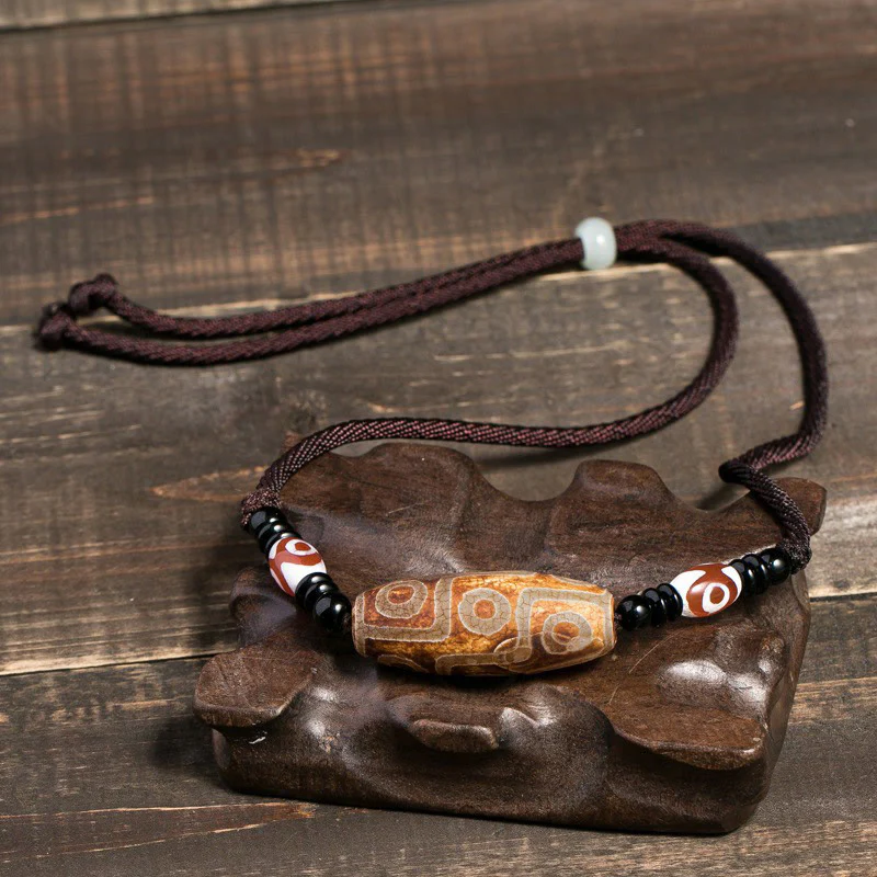 Buddha Stones Collana di perline tibetane Dzi a nove occhi con cordino protettivo - Image 9