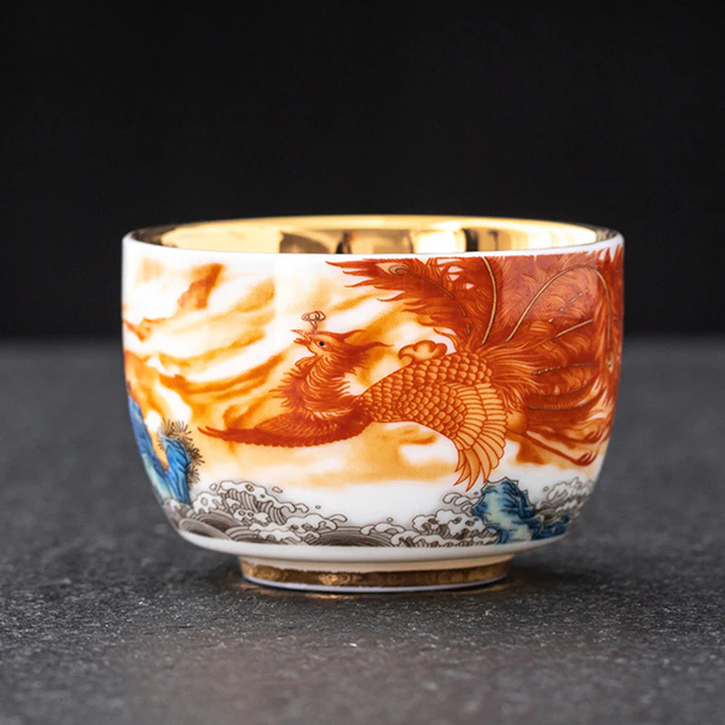 Buddha Stones Drago Fenice Gru Sole Oceano Onde Tazza da tè in ceramica dorata Tazza da tè Kung Fu 170ml