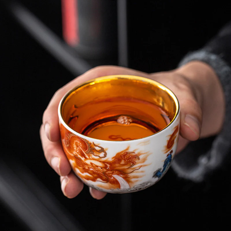 Buddha Stones Drago Fenice Gru Sole Oceano Onde Tazza da tè in ceramica dorata Tazza da tè Kung Fu 170ml - Image 4