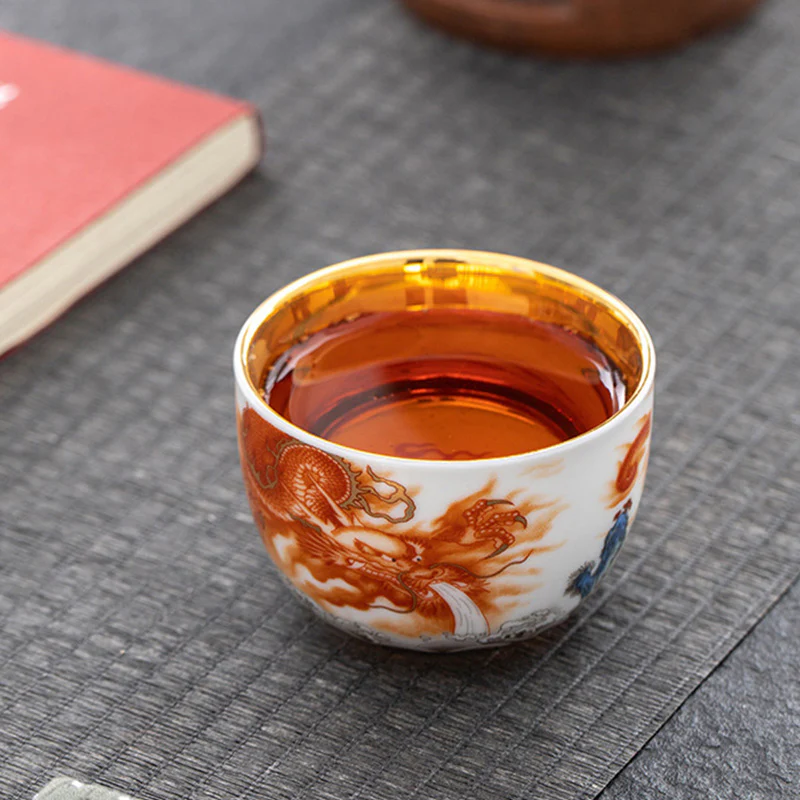 Buddha Stones Drago Fenice Gru Sole Oceano Onde Tazza da tè in ceramica dorata Tazza da tè Kung Fu 170ml - Image 8