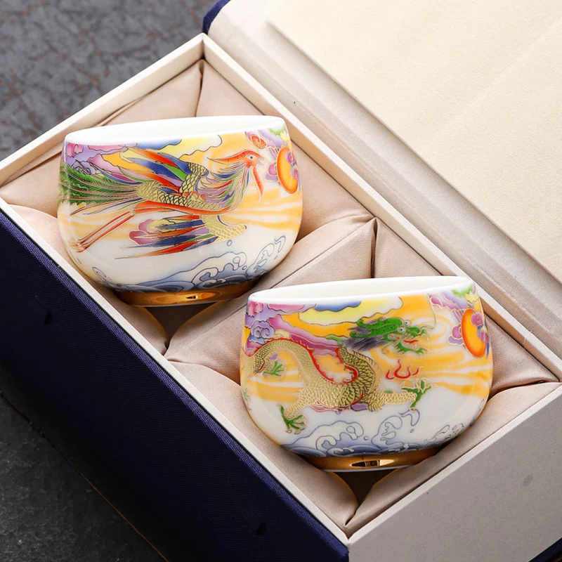 Buddha Stones Drago Fenice Nuvole di buon auspicio Sole Onde dell'oceano Tazza da tè in ceramica Tazza da tè Kung Fu