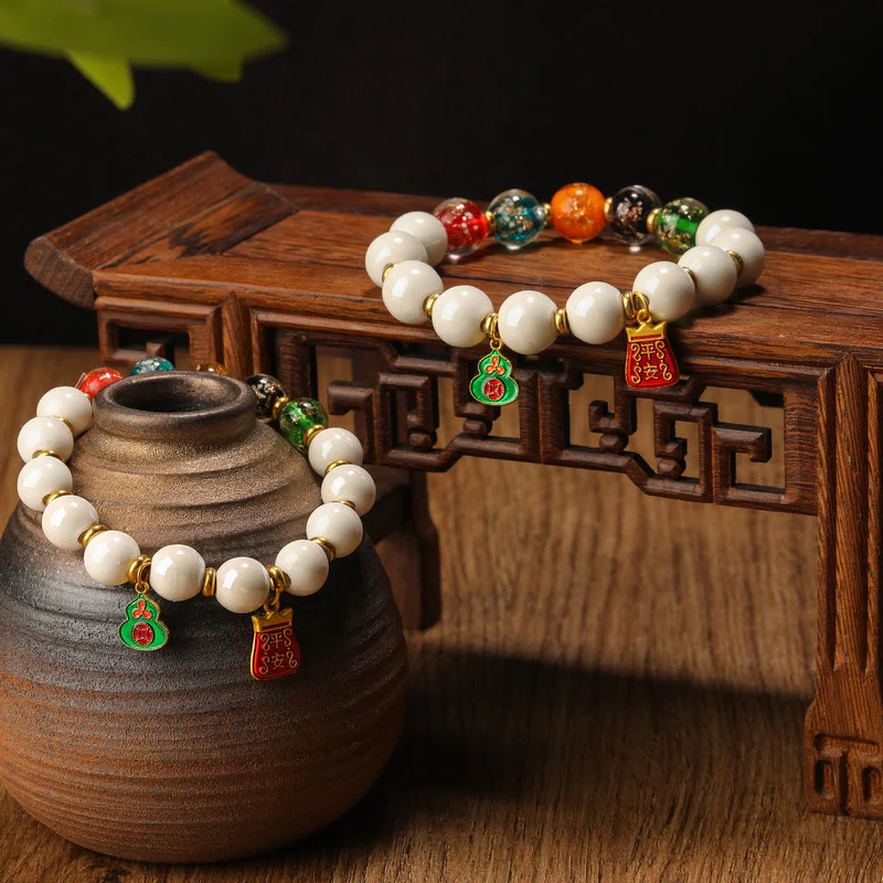 Buddha Stones, incenso tibetano, cenere, porcellana, perlina di vetro fluorescente luminosa, moneta di rame, ciondolo, braccialetto della pace