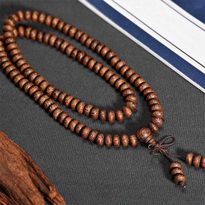 Buddha Stones Mala con 108 perline di legno testurizzate per un'energia calmante - Image 4