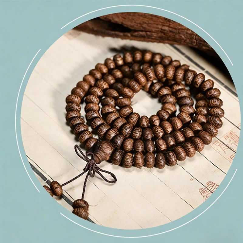 Buddha Stones Mala con 108 perline di legno testurizzate per un'energia calmante - Image 9