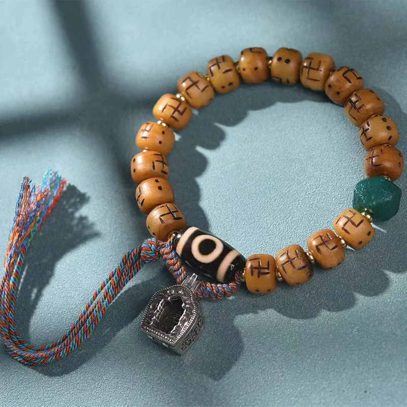 Buddha Stones naturale tibetano osso di cammello svastica Dzi perlina Shankha Buddha fascino Kirtimukha braccialetto con nappa protezione fortuna