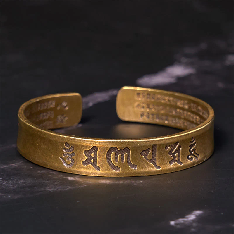 Buddha Stones Sei parole vere 'om Mani Padme Hum' Sutra del cuore Bracciale rigido in ottone e rame per la pace interiore - Image 2