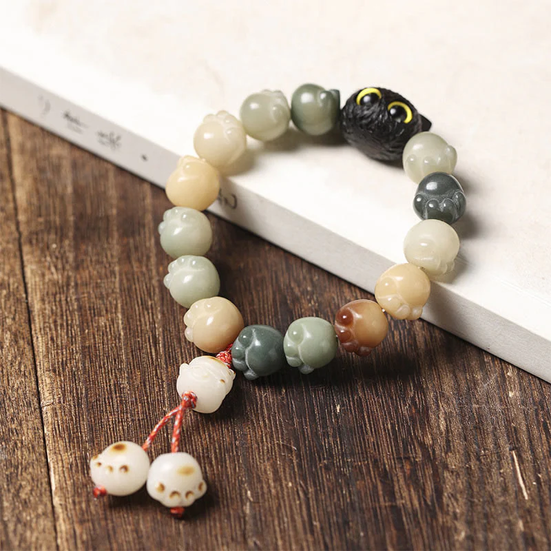 Buddha Stones Semi di Bodhi naturali Zampa adorabile Braccialetto di saggezza del gatto fortunato in legno di ebano - Image 10