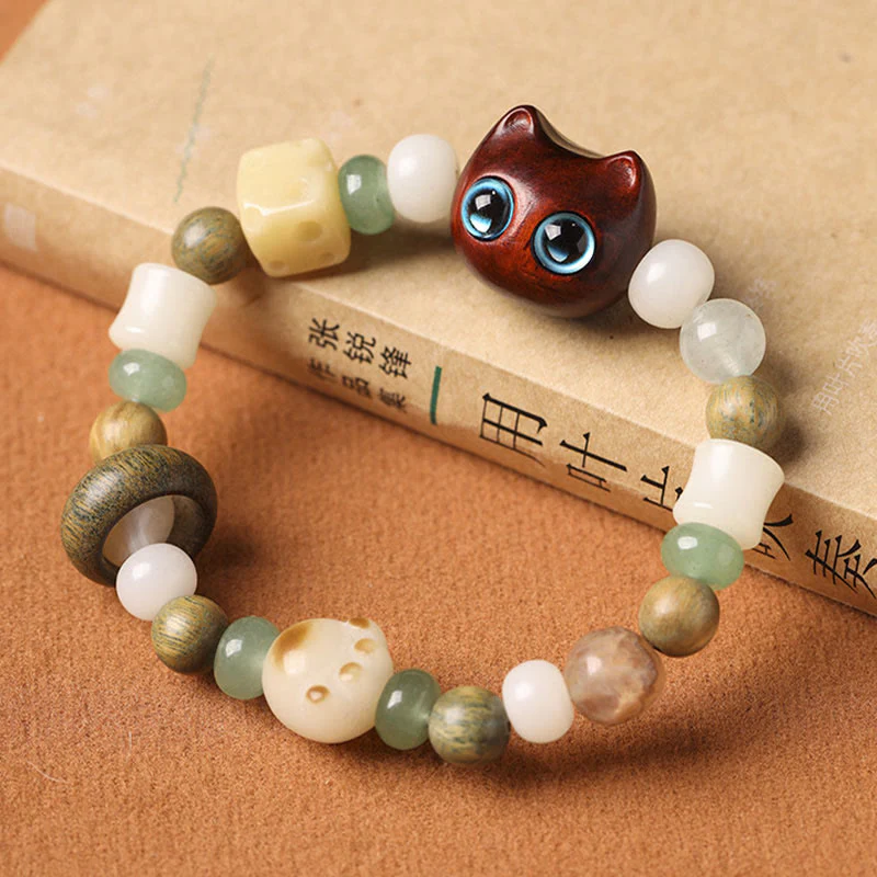 Buddha Stones Semi di Bodhi Sandalo verde Legno di ebano Foglia piccola Sandalo rosso Testa di gatto Zampa Artiglio Bracciale della pace - Image 11