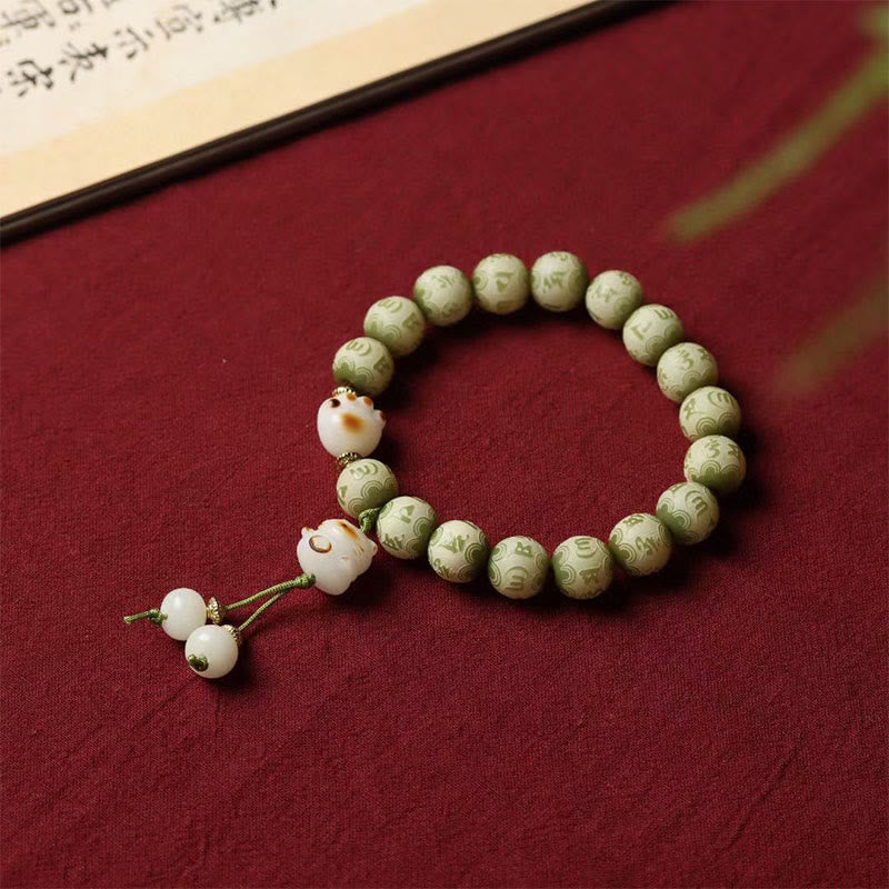Buddha Stones Semi di Bodhi verdi Zampa di gatto Om Mani Padme Hum Braccialetto della saggezza inciso