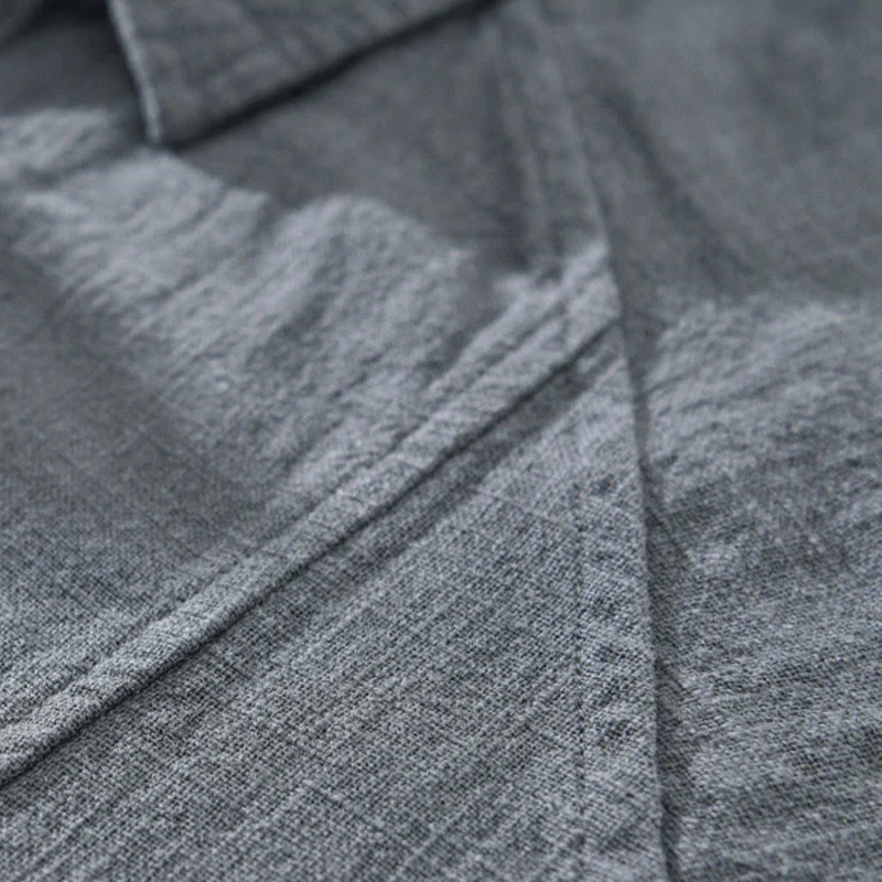 Camicia a maniche lunghe con risvolto e tasche in cotone ramiè tinta unita da uomo Buddha Stones - Image 9