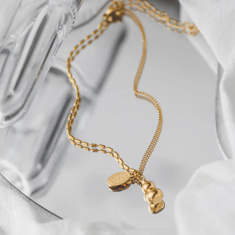 Cavigliera con fibbia della ricchezza e design a zucca portafortuna in rame placcato oro 18k Buddha Stones - Image 5