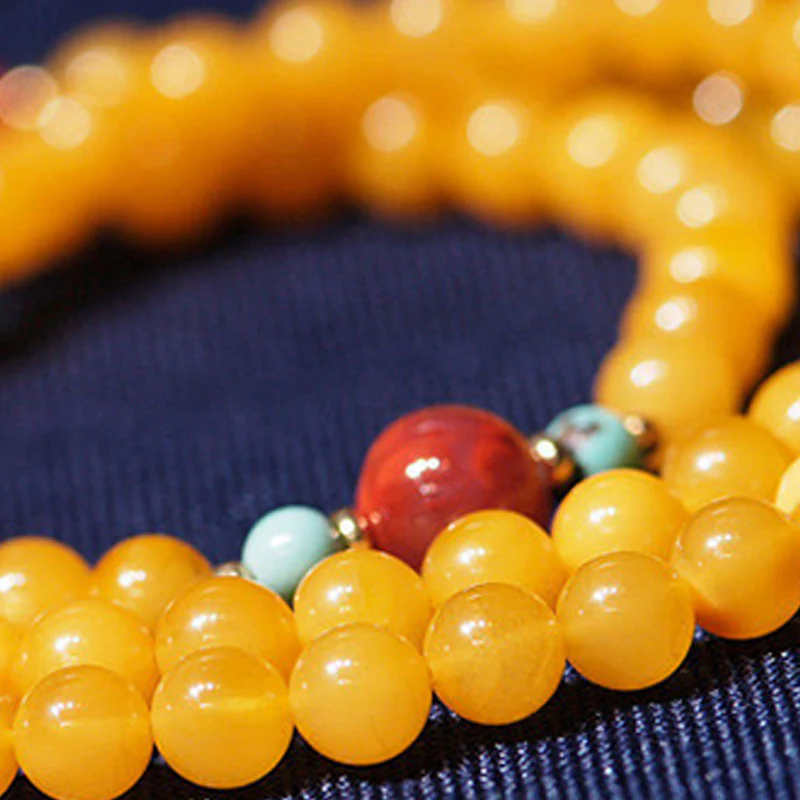 Collana con ciondolo a forma di fiore in ambra curativa e bilanciata - Image 9
