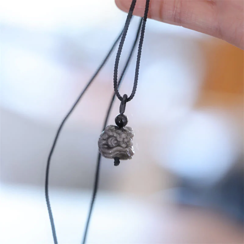 Collana con ciondolo di protezione del leone danzante in ossidiana lucida d'argento naturale Buddha Stones - Image 9