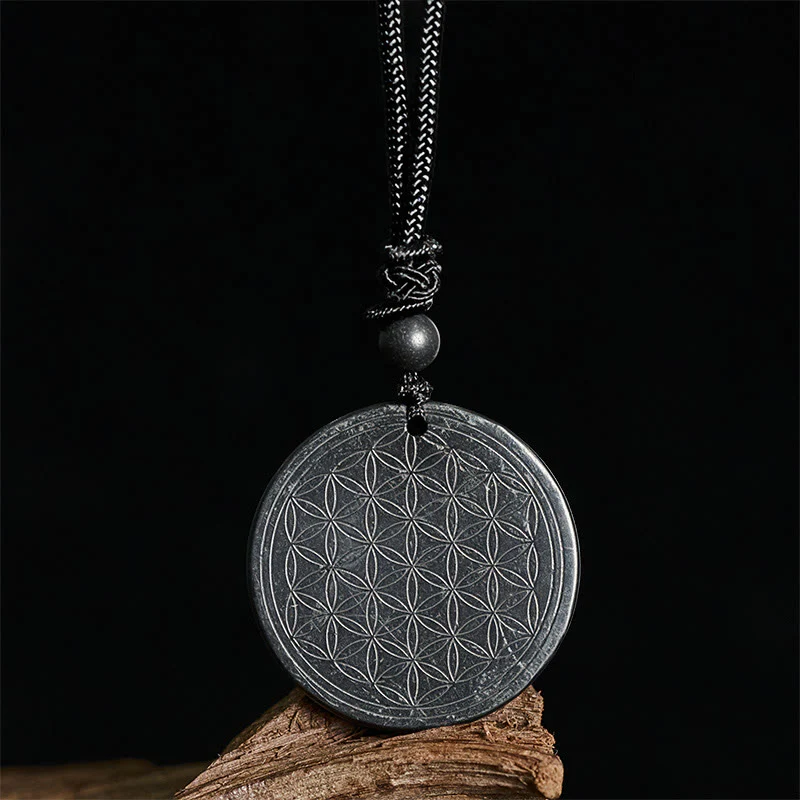 Collana con ciondolo di protezione in pietra di shungite autentica con intaglio del fiore della vita Buddha Stones - Image 12