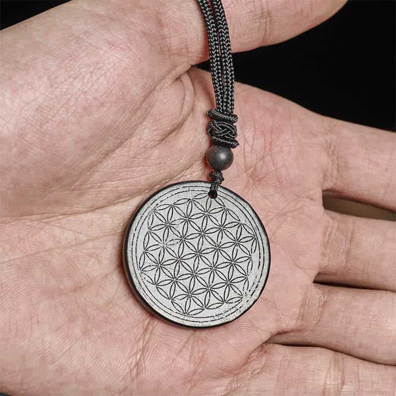 Collana con ciondolo di protezione in pietra di shungite autentica con intaglio del fiore della vita Buddha Stones - Image 13