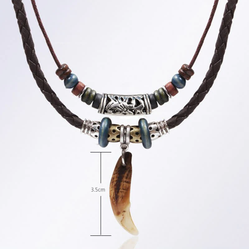 Collana con ciondolo etnica con motivo a denti di lupo e perline, simbolo della ricchezza - Image 9