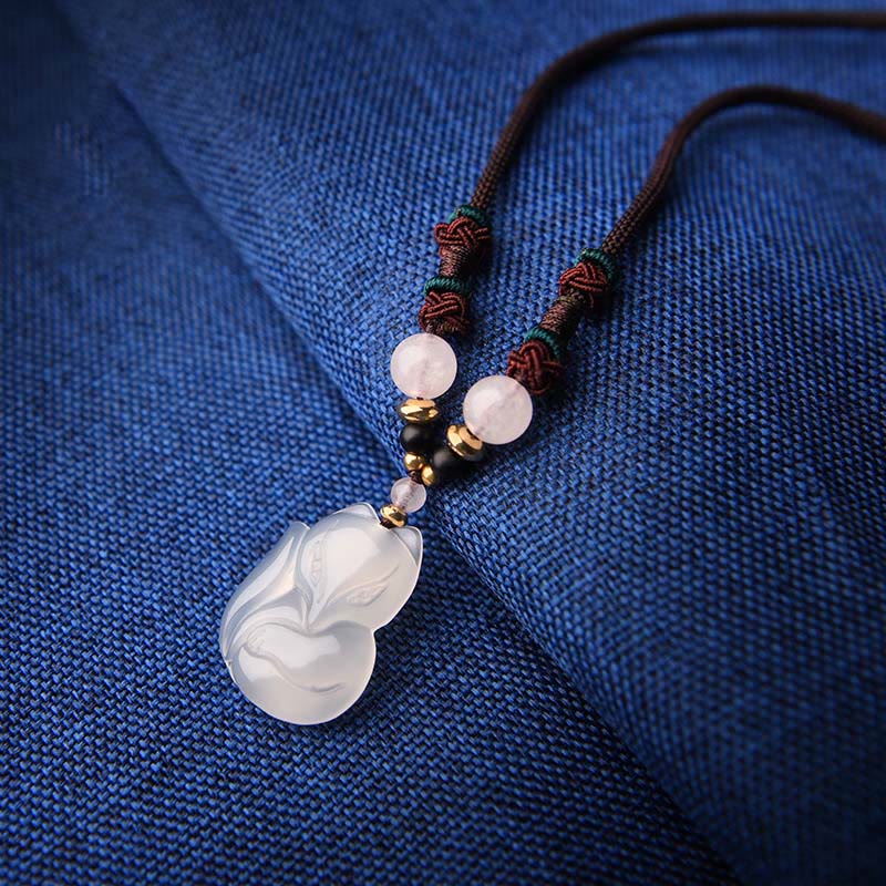 Collana con ciondolo in corda dell'armonia con perline di cristallo rosa di volpe e calcedonio Buddha Stones - Image 3