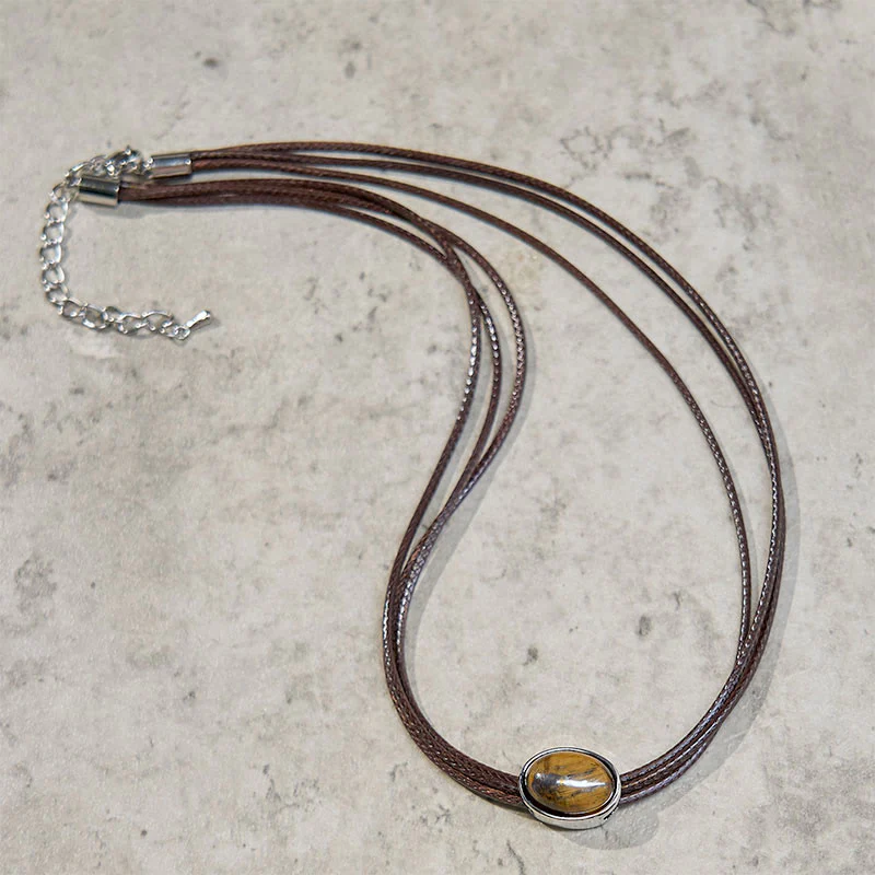 Collana con ciondolo in corda di cera con protezione ellittica in occhio di tigre naturale Buddha Stones - Image 4